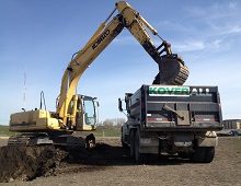 Koverall Industries Airdrie Landscaping, Excavating, Trucking and Snow Removal